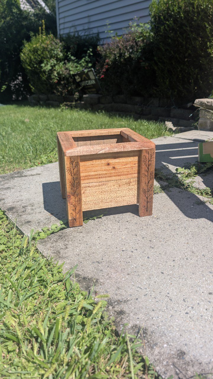 Planter with hand-detailed botanical artwork